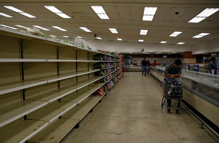 people-buy-food-and-other-staple-goods-inside-a-supermarket-in-caracas-venezuela-june-30-2016